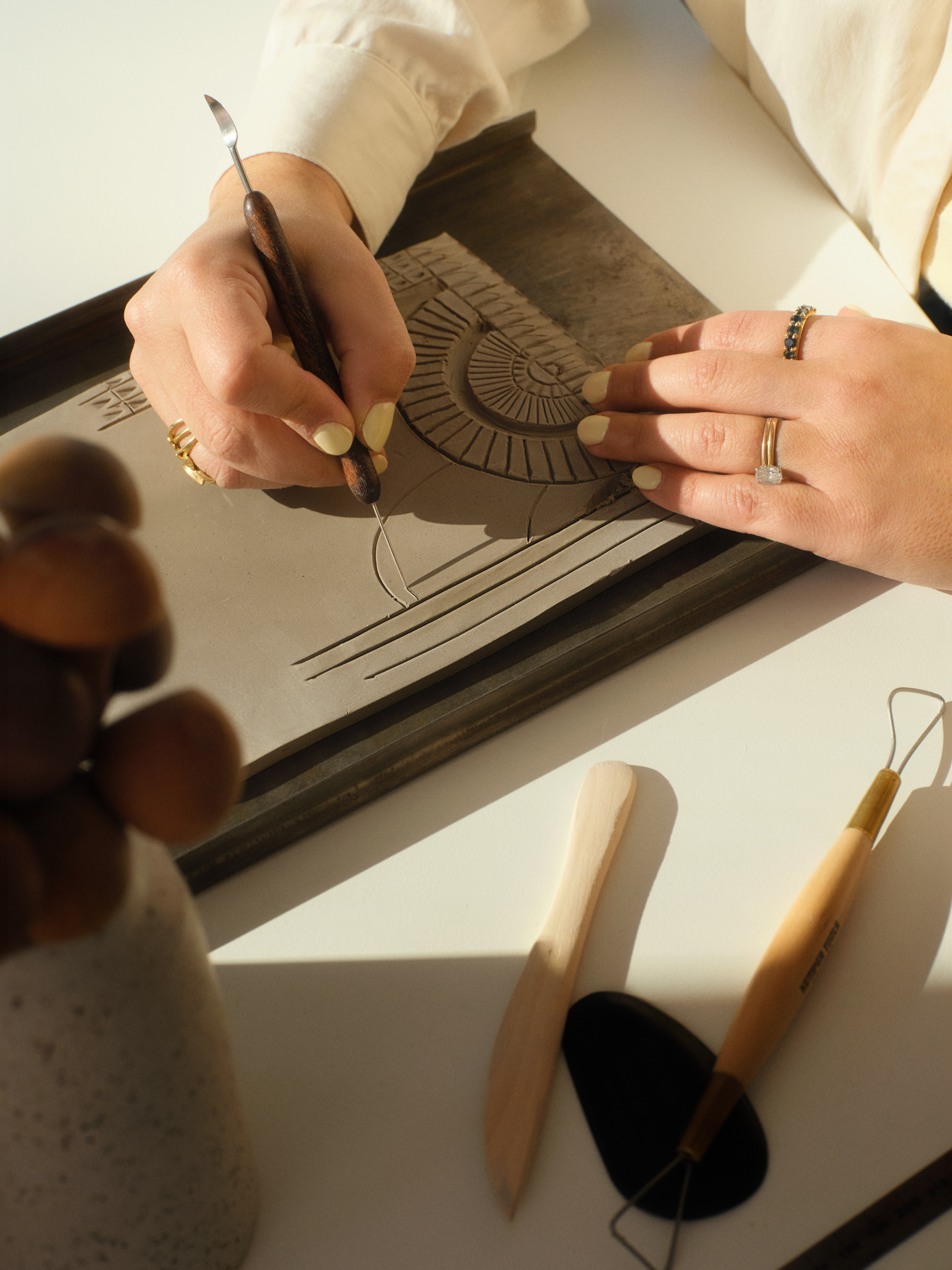 Elena carving a matrix